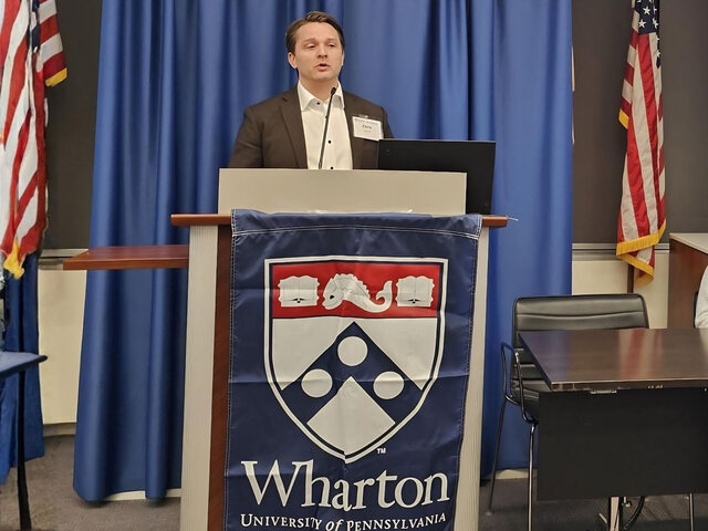 Christopher Hooton speaking at a Wharton event