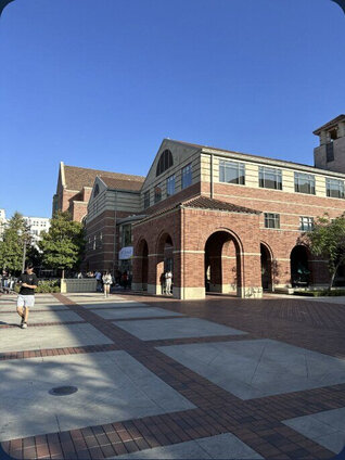 1752vc founders gathering on campus outside a brick building