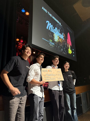 Founders celebrating a pitch award